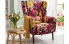 Křeslo ušák Canto, látka s motivem barevných květů